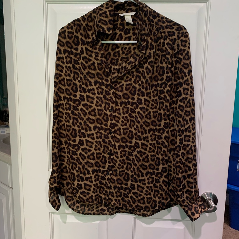 Never worn cheetah blouse button up .